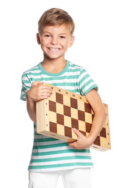 Jongen met schaakbord — Stockfoto