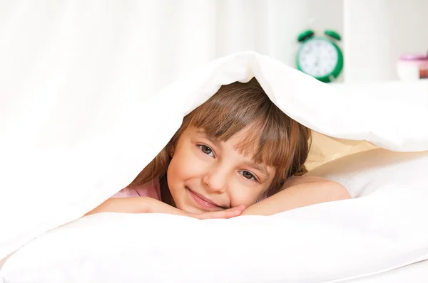 Girl on bed — Stock Photo, Image