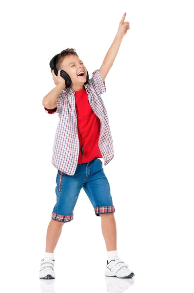 Niño feliz con auriculares — Foto de Stock