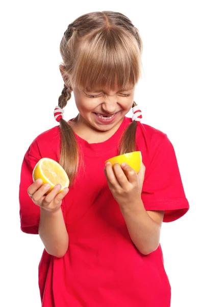 Little girl with lemon — Stock Photo, Image