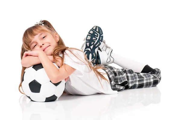 Liten flicka med fotboll — Stockfoto