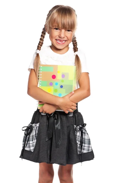 Little girl with exercise books — Stock Photo, Image