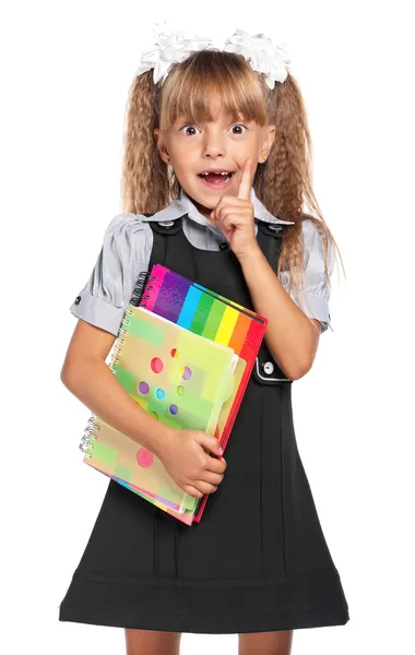 Kleines Mädchen mit Schulheften — Stockfoto