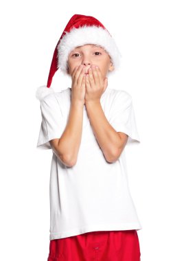 Noel Baba şapkalı çocuk