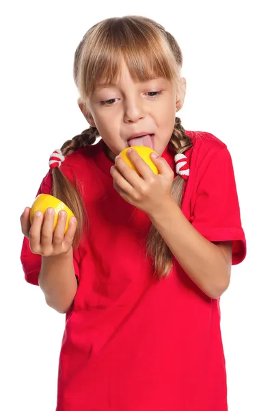 Little girl with lemon — Stock Photo, Image