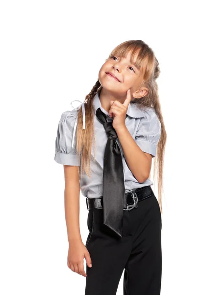 Liten flicka i skoluniform — Stockfoto