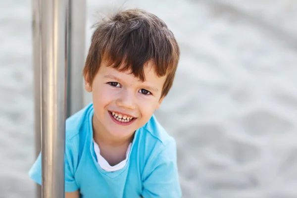 Happy young boy at playground — Stock Photo, Image