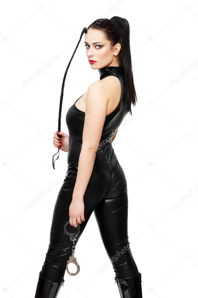 Sexy woman in latex catsuit and whip
