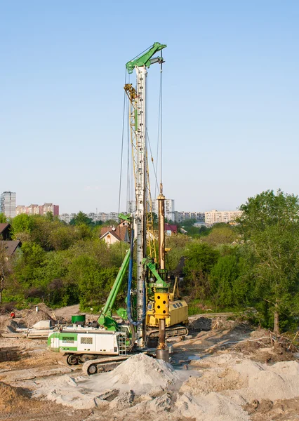 Pile driver at a construction site — Stock Photo, Image