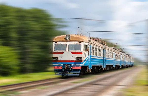 Suburban electric train on a blurred background — Stock Photo, Image