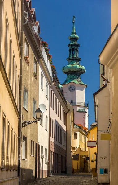 A street in Bratislava old town, with view on Michael Gate — Stock Photo, Image