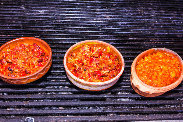 Food is served in ceramic pots