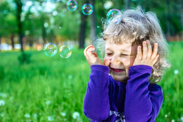 Outdoor portrait of cute little girl on the meadow — Stock Photo, Image