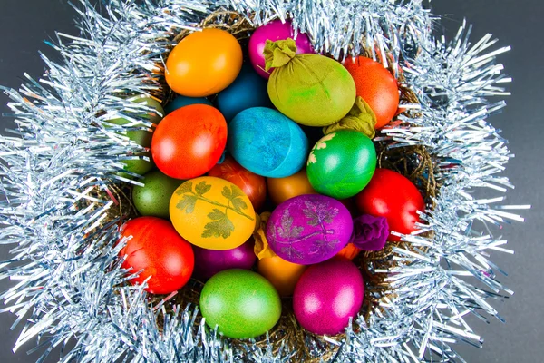 Decorated Easter eggs in a nest — Stock Photo, Image