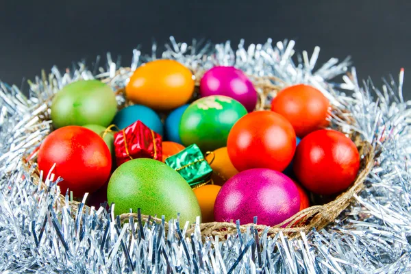 Decorated Easter eggs in a nest — Stock Photo, Image