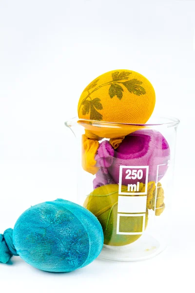 Easter eggs in lab glass — Stock Photo, Image