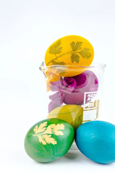 Easter eggs in lab glass — Stock Photo, Image
