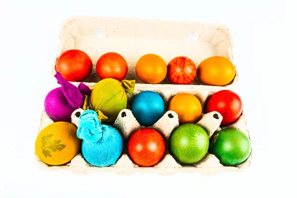Traditional decorated eggs in carton egg box — Stock Photo, Image