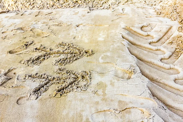 Drawings in sand — Stock Photo, Image