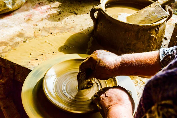 Working at pottery wheel — Stock Photo, Image