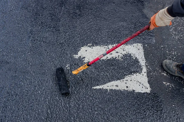 Worker Coating Tarmac Using Brush Roller Apply First Basic Protective — Stock Photo, Image