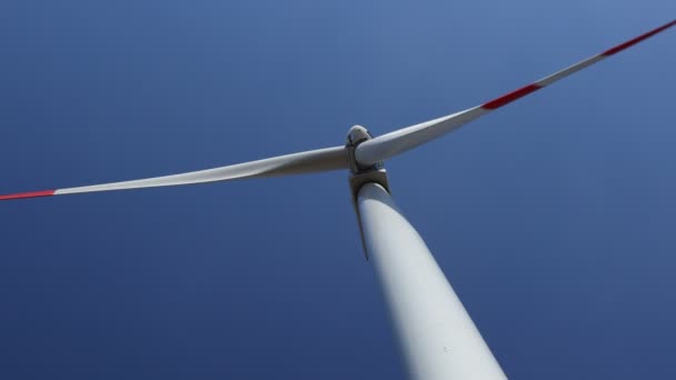 Low Angle View Wind Generator Turbines Rotating Blades Propellers Blue — Stock Video