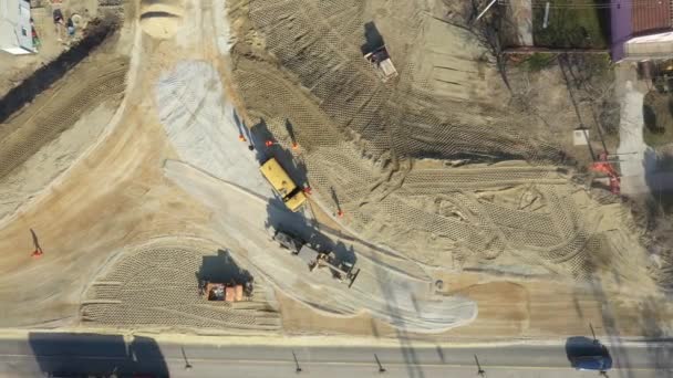 Top View Dolly Move Overhead Workers Watering Construction Site Using — Stock Video