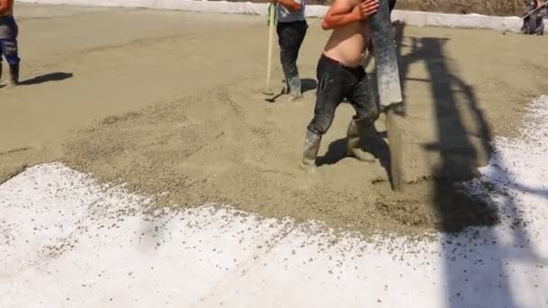 Construction Worker Directing Pump Tube Right Direction Pouring First Layer — Video