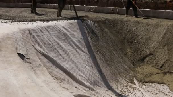 Construction Worker Directing Pump Tube Right Direction Pouring First Layer — Αρχείο Βίντεο