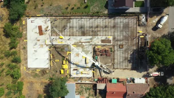 Aerial Top View Construction Site Mixer Truck Pouring Concrete Pump — Wideo stockowe