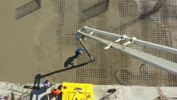 Aerial Top View Construction Worker Directing Pump Tube Right Direction — Video