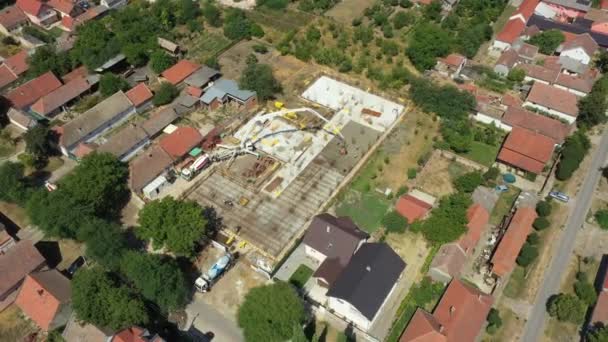Aerial View Cityscape Construction Site Mixer Truck Pouring Concrete Pump — Wideo stockowe