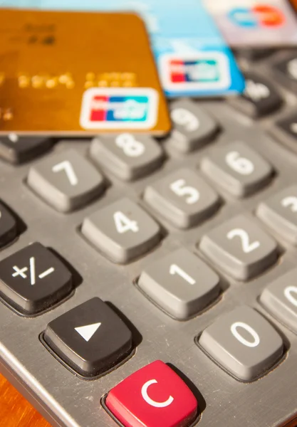 Calculator and bank card — Stock Photo, Image