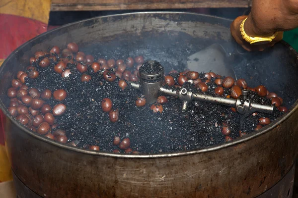 Roasting chestnuts Malaysia — Stock Photo, Image