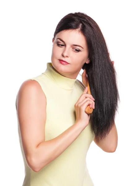 Menina com escova de cabelo — Fotografia de Stock