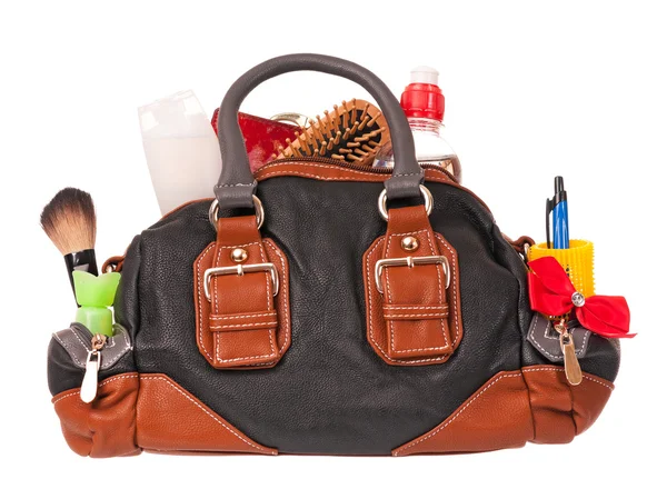 Overflowed handbag — Stock Photo, Image