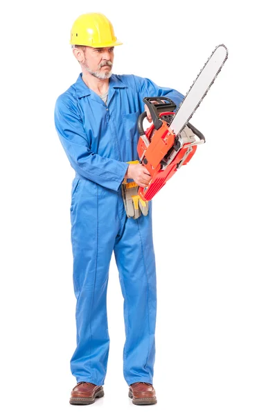 Worker with a chainsaw — Stock Photo, Image