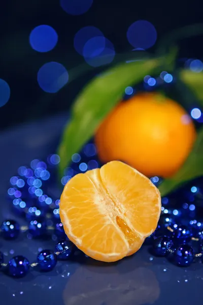 Tangerines on a dark blue background - New Year Mandarins — Stock Photo, Image
