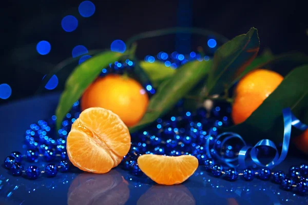 Tangerines on a dark blue background - New Year Mandarins — Stock Photo, Image