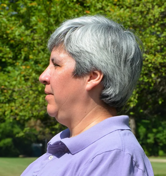 Older woman on bench — Stock Photo, Image