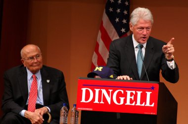 Former President Bill Clinton and Congressman John Dingell clipart