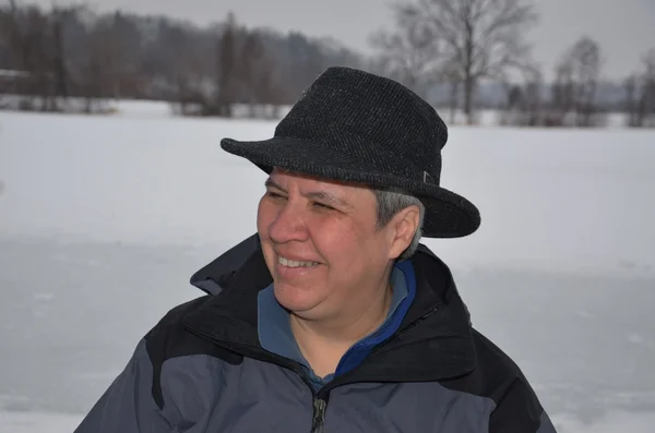 Middle aged woman in winter scene — Stock Photo, Image