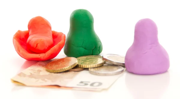 Tonfiguren mit Geld modellieren — Stockfoto