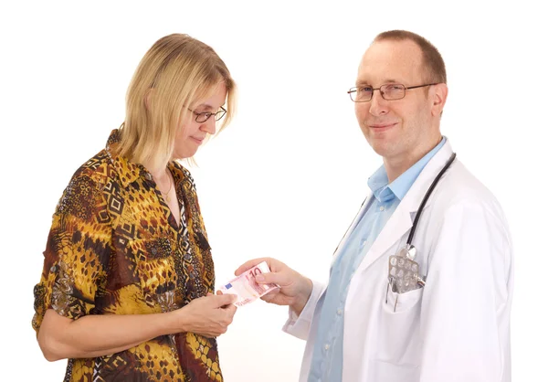 Médico y paciente con dinero — Foto de Stock