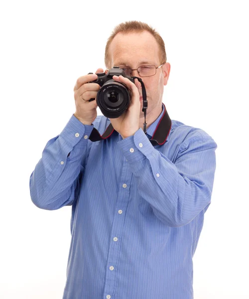 Фотограф с рефлекторной камерой — стоковое фото