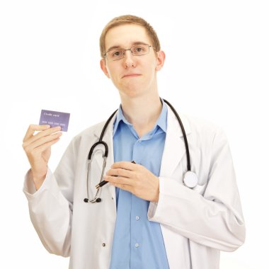 A young medical doctor with a credit card clipart
