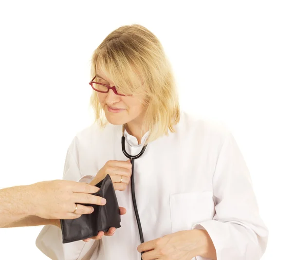 A medical doctor accepts funds — Stock Photo, Image