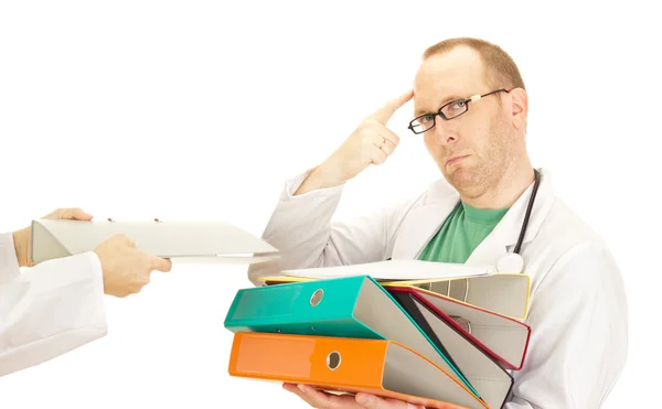 Medical doctor with a lot of work — Stock Photo, Image