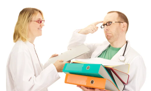 Medical doctor with a lot of work — Stock Photo, Image