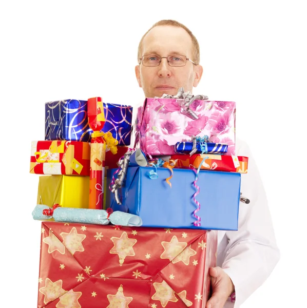 Doctor with a lot of gifts — Stock Photo, Image